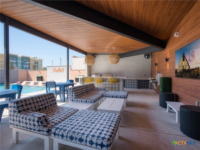 view of patio / terrace with outdoor lounge area and exterior kitchen