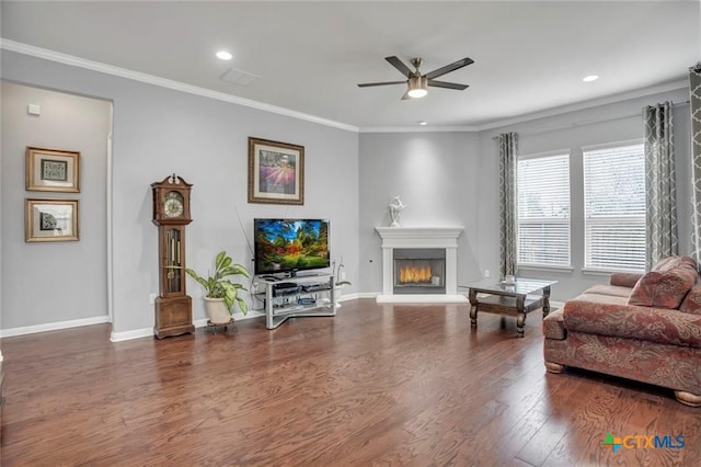 1400 Little Elm Trl Unit 1215, Cedar Park, TX 78613 - living room featuring ceiling fan, wood finished floors, a glass covered fireplace, recessed lighting, and crown molding