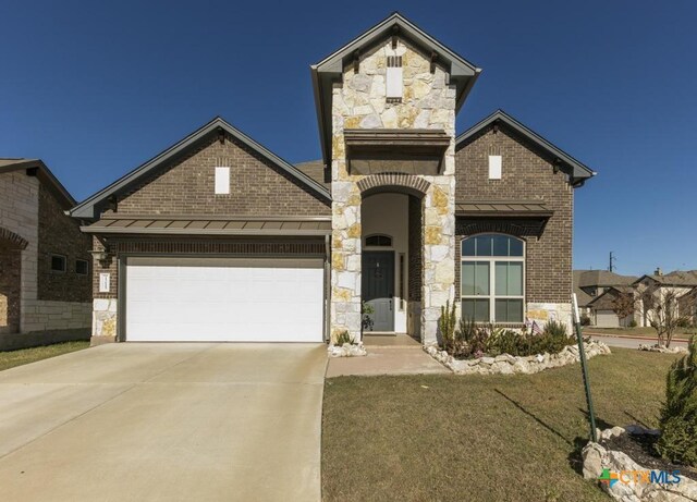 1400 Little Elm Trl Unit 1215, Cedar Park, TX 78613 - french country inspired facade with a standing seam roof and stone siding