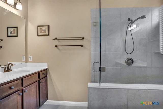 1400 Little Elm Trl Unit 1215, Cedar Park, TX 78613 - full bath featuring tiled shower, vanity, and tile patterned floors
