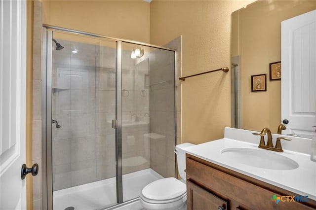 1400 Little Elm Trl Unit 1215, Cedar Park, TX 78613 - bathroom featuring vanity, a stall shower, and a textured wall