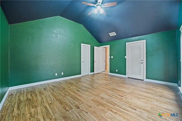 2203 Lancaster St, San Marcos, TX 78666 - bonus room with lofted ceiling, wood finished floors, a ceiling fan, baseboards, and a textured wall