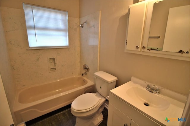 full bathroom with bathing tub / shower combination, vanity, wood-type flooring, and toilet