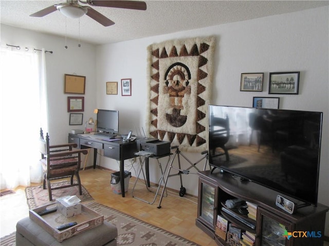 1004 Daviot Dr, Briarcliff, TX 78669 - living room featuring ceiling fan, a textured ceiling, and an office area