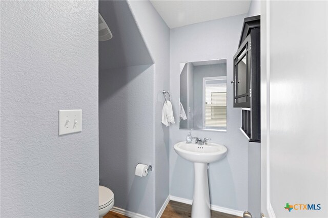 12 Trinity Cir, Lockhart, TX 78644 - bathroom with toilet and baseboards