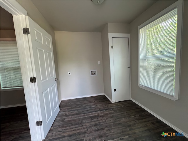 laundry area with hookup for a washing machine, dark hardwood / wood-style floors, and hookup for an electric dryer