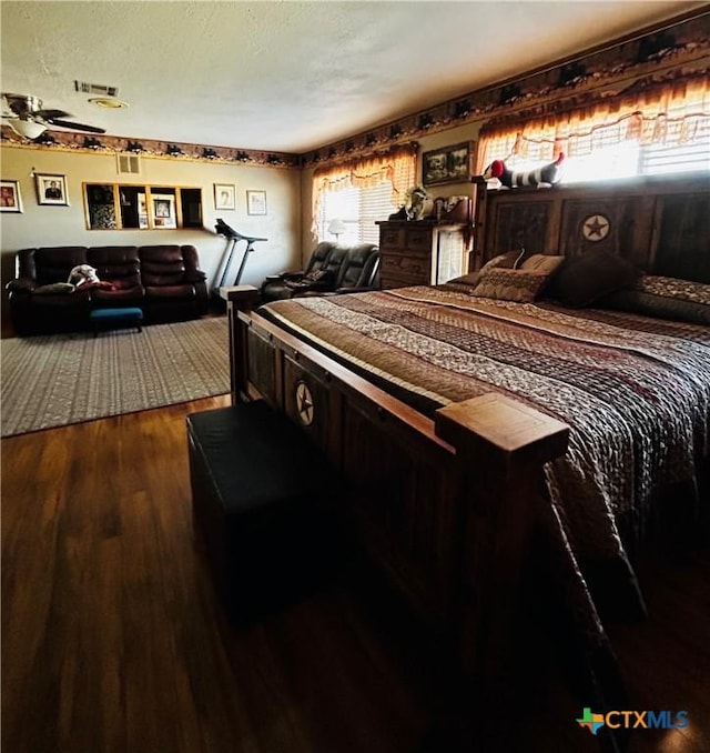 bedroom featuring hardwood / wood-style floors