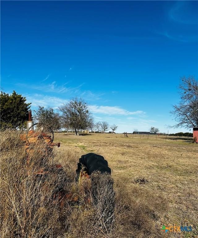 view of landscape with a rural view