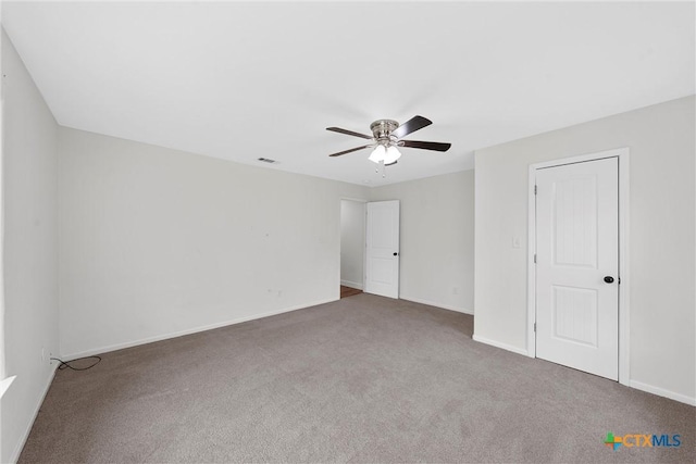 7031 Steinbeck Bend Dr, Waco, TX 76708 - unfurnished bedroom featuring carpet and a ceiling fan