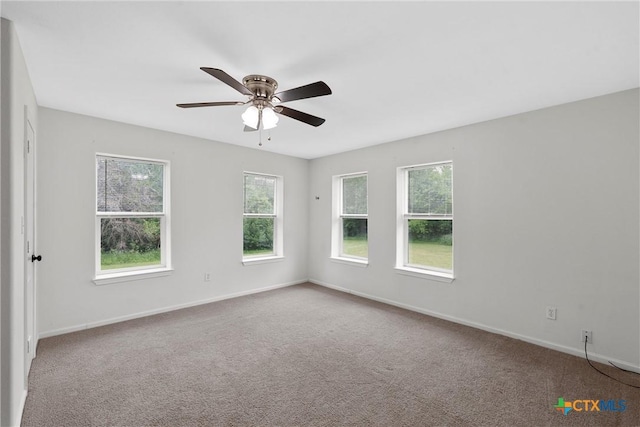 7031 Steinbeck Bend Dr, Waco, TX 76708 - carpeted empty room with baseboards and ceiling fan