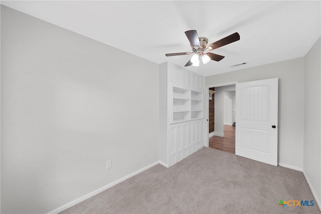 7031 Steinbeck Bend Dr, Waco, TX 76708 - unfurnished bedroom featuring carpet and a ceiling fan