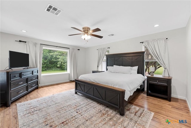 7031 Steinbeck Bend Dr, Waco, TX 76708 - bedroom featuring light wood finished floors, ceiling fan, and recessed lighting