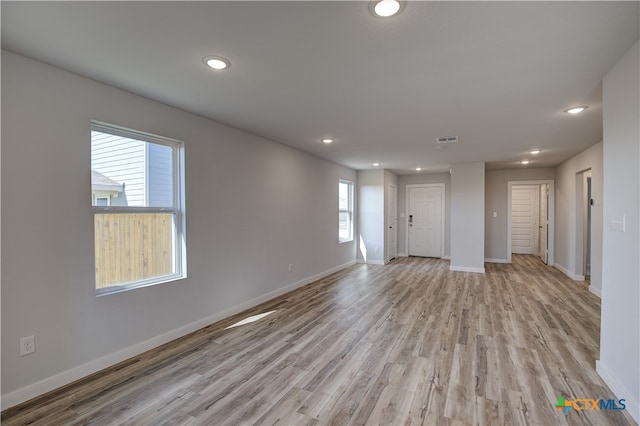 empty room featuring light hardwood / wood-style floors