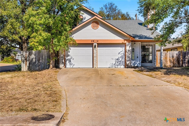 view of front of property featuring a garage