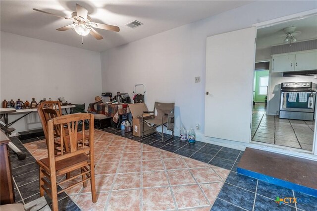 216 Prospect St, Seguin, TX 78155 - interior space with a ceiling fan, tile patterned floors, and visible vents