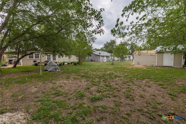 216 Prospect St, Seguin, TX 78155 - view of yard featuring an outdoor structure