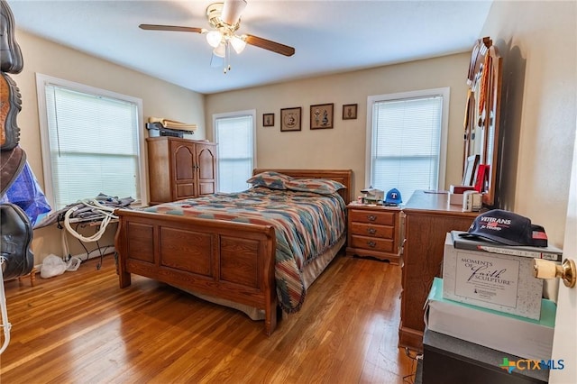 216 Prospect St, Seguin, TX 78155 - bedroom featuring ceiling fan and light wood-type flooring