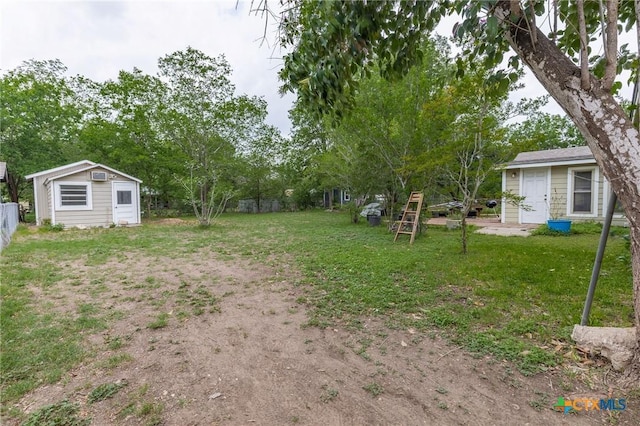 216 Prospect St, Seguin, TX 78155 - view of yard with fence and an outdoor structure