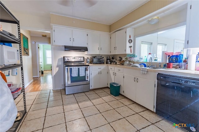 216 Prospect St, Seguin, TX 78155 - kitchen featuring a healthy amount of sunlight, dishwasher, exhaust hood, and stainless steel electric range oven