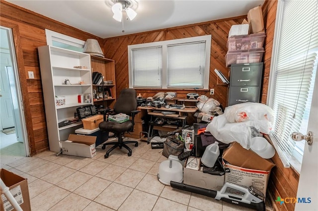 216 Prospect St, Seguin, TX 78155 - office with plenty of natural light, a ceiling fan, light tile patterned floors, and wooden walls
