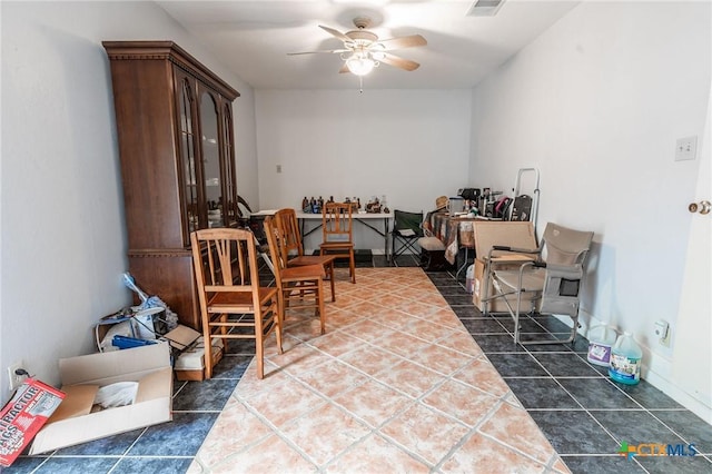 216 Prospect St, Seguin, TX 78155 - interior space featuring a ceiling fan and dark tile patterned flooring