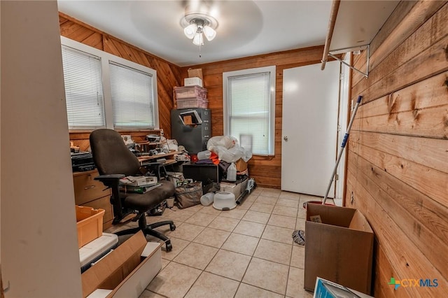 216 Prospect St, Seguin, TX 78155 - office area with wooden walls, a ceiling fan, and light tile patterned flooring