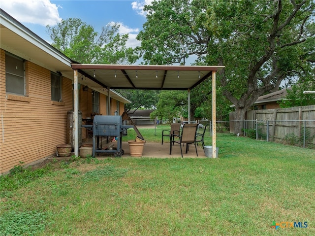 view of yard with a patio area