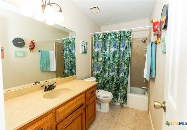 full bathroom with shower / tub combo with curtain, vanity, toilet, and tile patterned floors