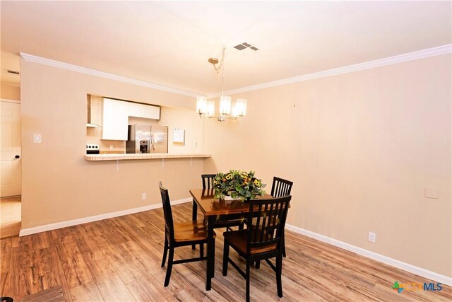 4020 River Oaks Cir, Temple, TX 76504 - living room featuring ornamental molding, light wood-type flooring, a tray ceiling, and ceiling fan