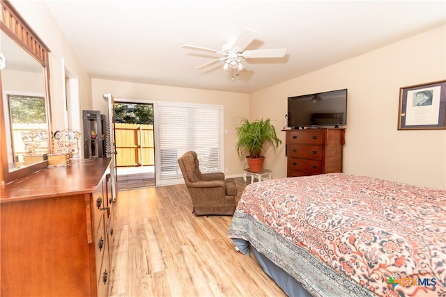 bedroom featuring light wood-type flooring and ceiling fan