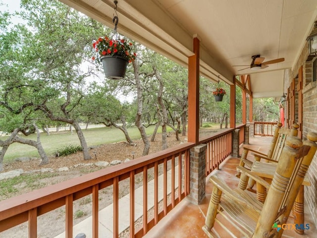 1777 Crossbow Dr, Canyon Lake, TX 78133 - wooden deck featuring ceiling fan and a porch