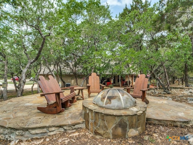 1777 Crossbow Dr, Canyon Lake, TX 78133 - view of patio / terrace featuring a fire pit