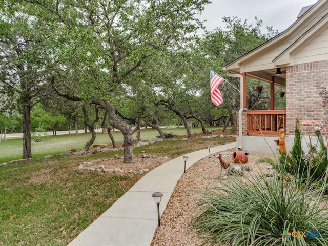 1777 Crossbow Dr, Canyon Lake, TX 78133 - view of yard with a ceiling fan and a porch