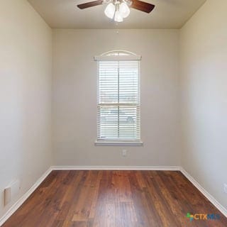5120 Siltstone Loop, Killeen, TX 76542 - unfurnished room featuring ceiling fan, wood finished floors, and baseboards