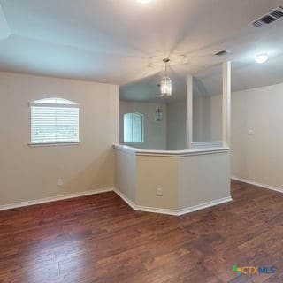 5120 Siltstone Loop, Killeen, TX 76542 - spare room with baseboards and wood finished floors