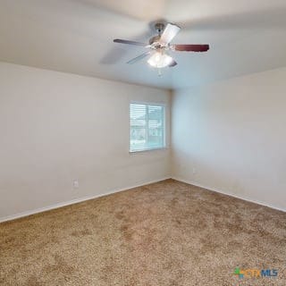 5120 Siltstone Loop, Killeen, TX 76542 - spare room featuring ceiling fan and carpet floors