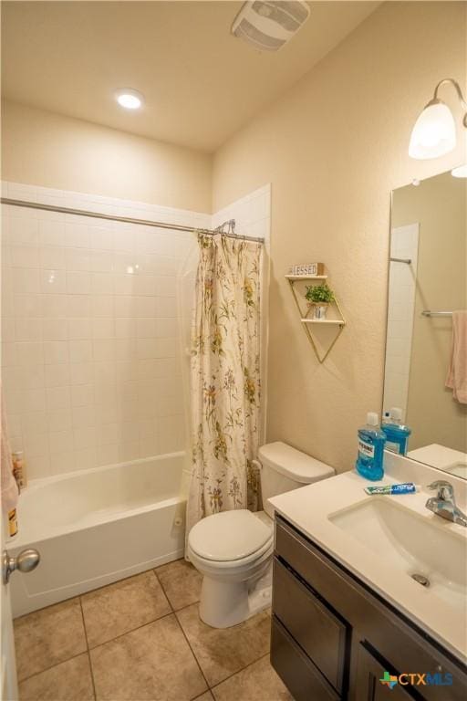 311 Danielle Dr, Killeen, TX 76542 - full bath featuring tile patterned flooring, vanity, shower / bathtub combination with curtain, and toilet