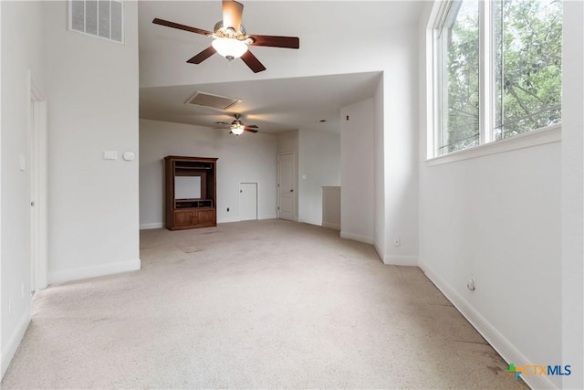 211 Scarlett Ridge Dr, Boerne, TX 78006 - unfurnished living room featuring ceiling fan and light carpet