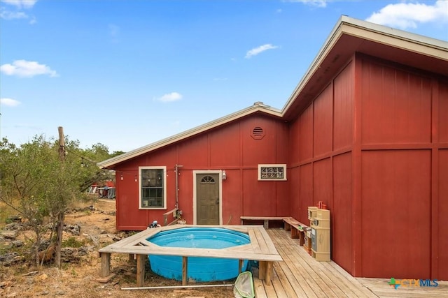 view of pool featuring a wooden deck