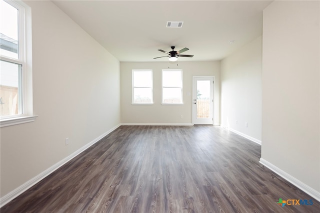 217 Alcatraz Loop, Jarrell, TX 76537 - unfurnished room with ceiling fan, dark wood-type flooring, and baseboards