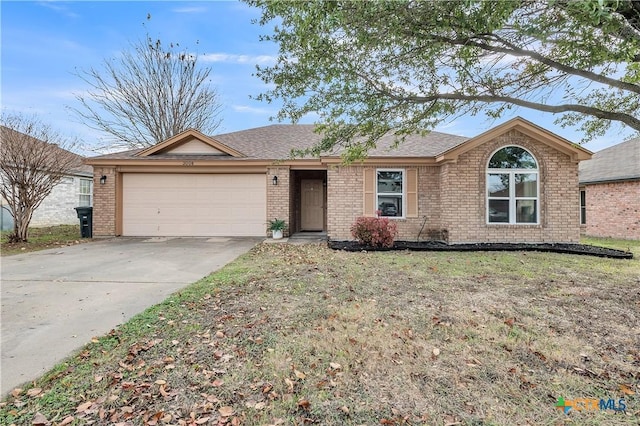 ranch-style home with a garage