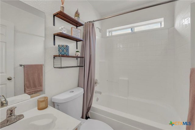 full bathroom with toilet, sink, and shower / tub combo