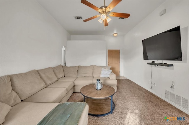 living room featuring ceiling fan