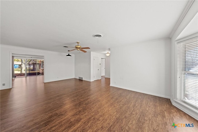 unfurnished living room with dark wood-style floors, ceiling fan, and visible vents