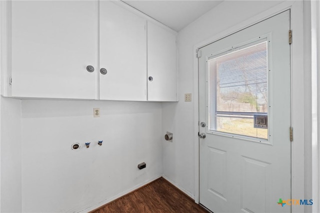 clothes washing area with hookup for a washing machine, dark wood finished floors, cabinet space, and hookup for an electric dryer