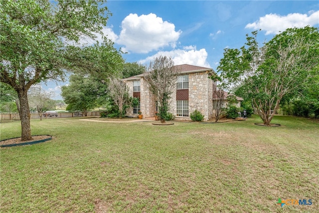 view of front of house featuring a front yard