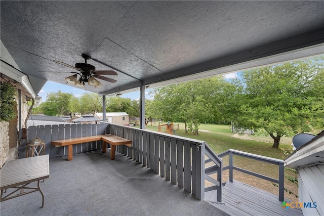 wooden terrace with ceiling fan