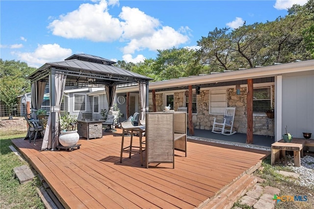 wooden terrace with a gazebo