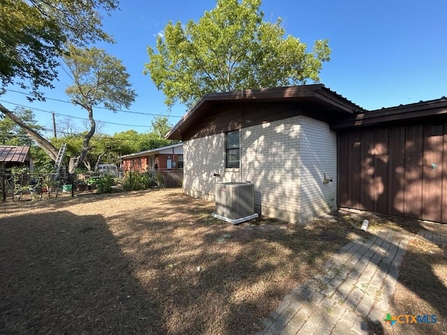 view of property exterior with cooling unit