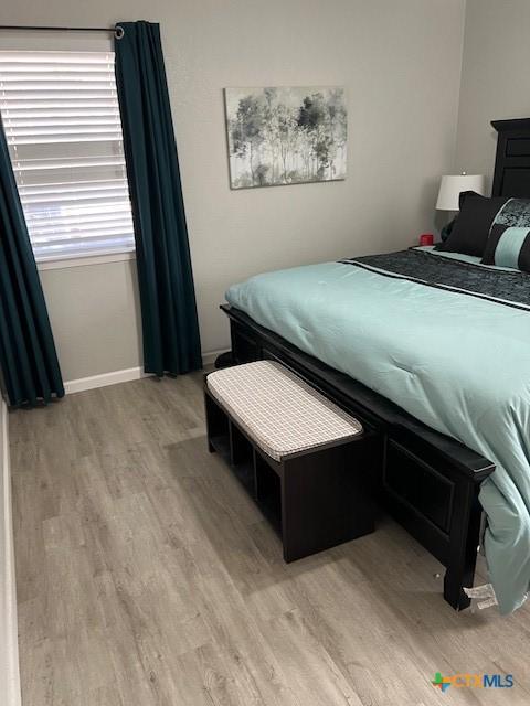 bedroom featuring light hardwood / wood-style flooring